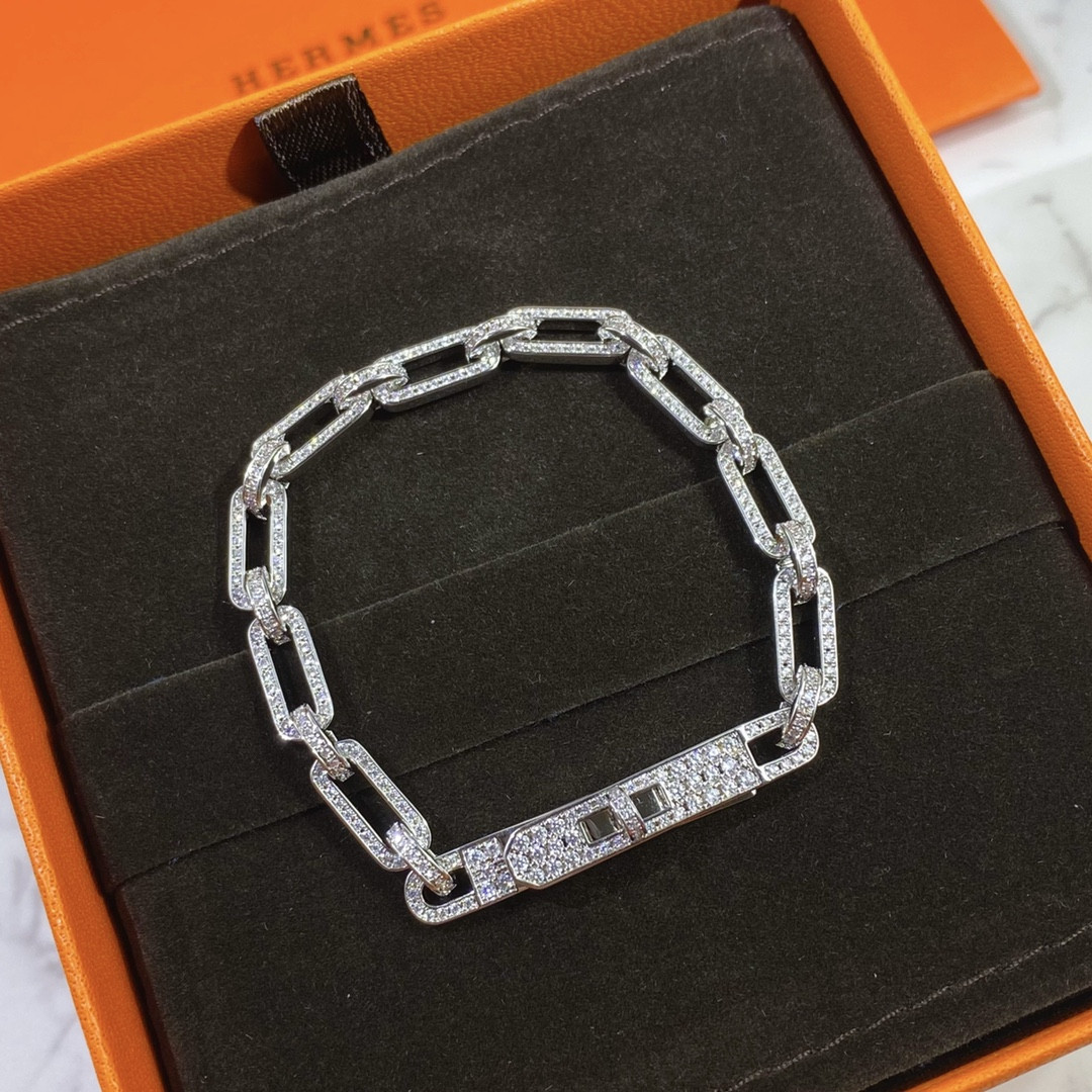 hermès fully Di*m*nd-encrusted kelly bracelet
