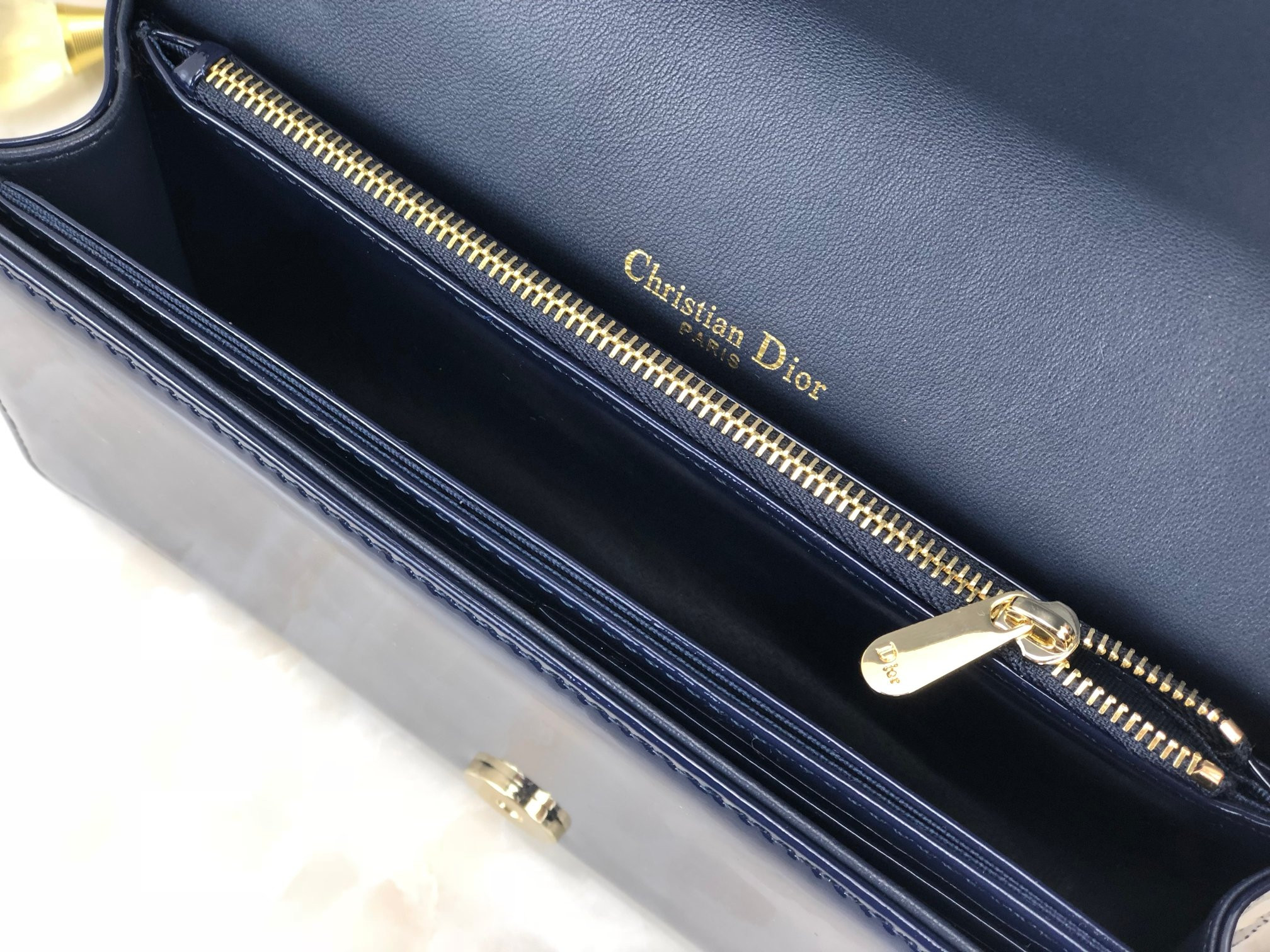 lady D*or pouch navy patent cannage calfskin 8.5 x 4.5 x 1 inches