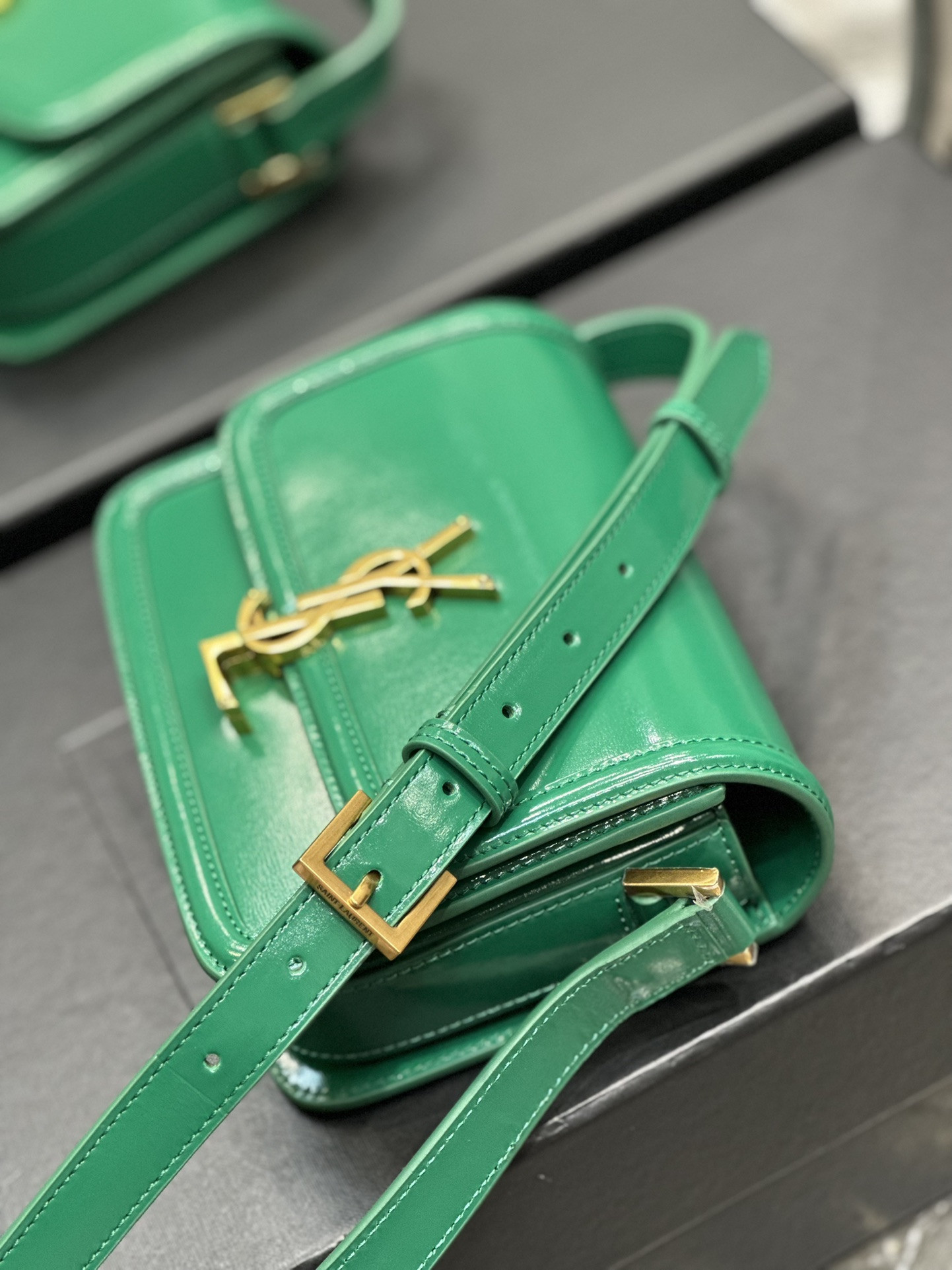 y*l solferino small satchel in box Sa**t Lau*nt green 7.4 x 5.1 x 1.9 inches