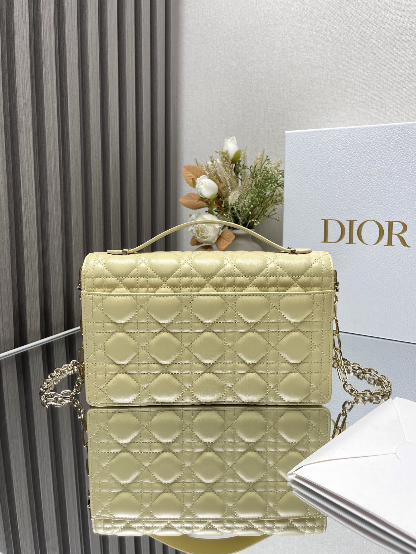 my D*or top handle bag 9.5 x 5.5 x 3 inches