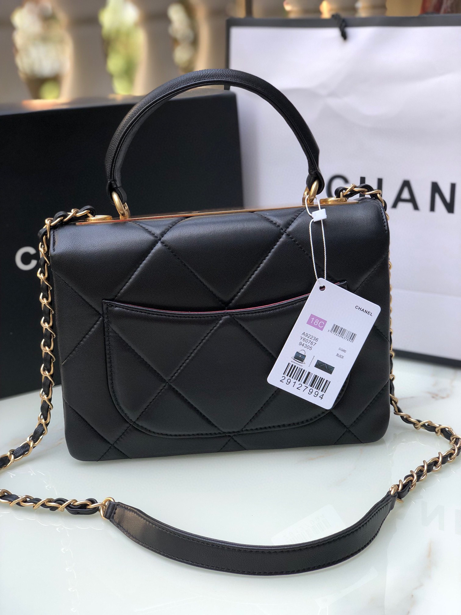Ch*el flap bag with top handle 6.6 × 9.8 × 4.7 in