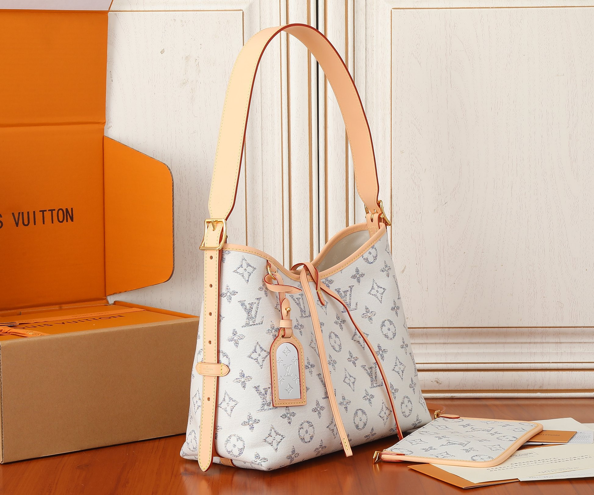 LV CarryAll PM M24707 11.6x9.4x4.7 inches