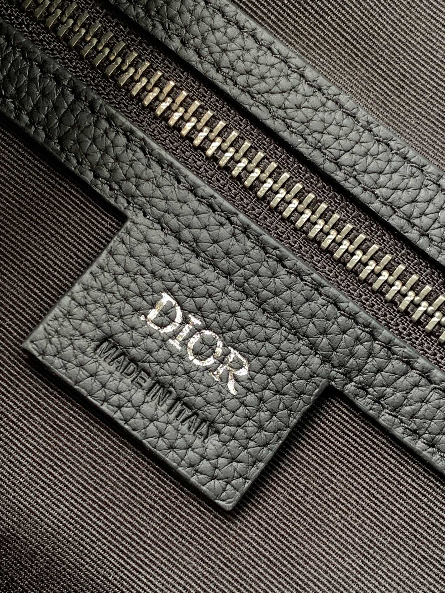 D*or 8 backpack with flap beige and black D*or oblique jacquard 31 x 48 x 16.5 cm